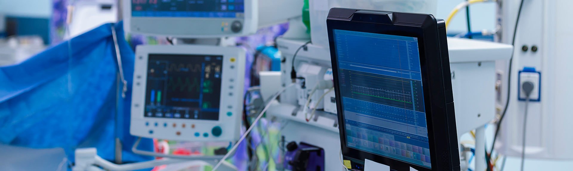 Image of medical equipment for patient monitoring in hospital room.