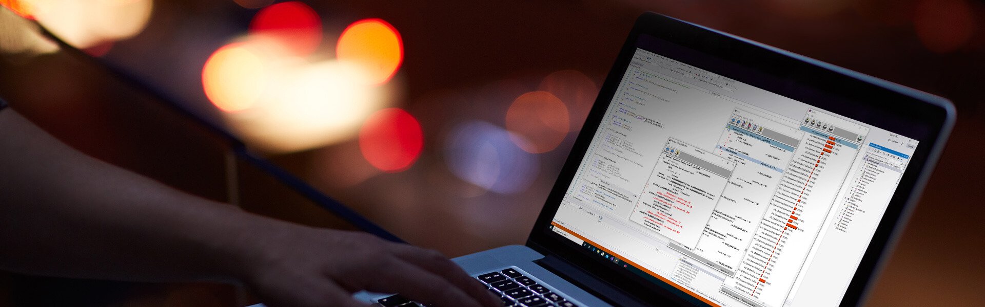 Person typing on computer with Insure++ on screen