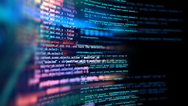 High quality code and lines of code on a distorted computer screen.