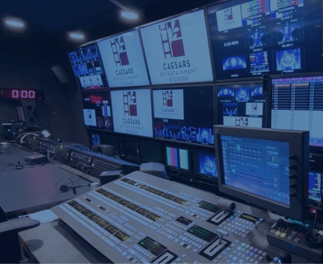 Image of studio control room with Caesars Entertainment Studios logo on the screens.