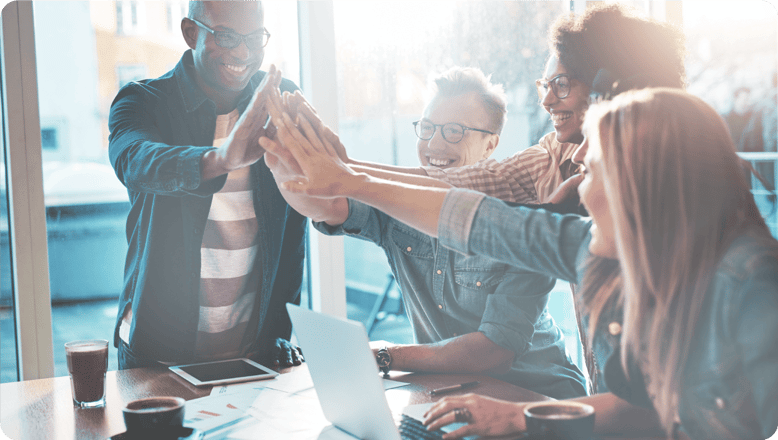 Image of group of people high fiving